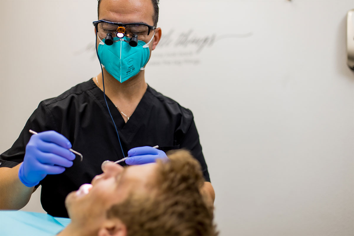 dentist during exam for Invisalign in Pasadena